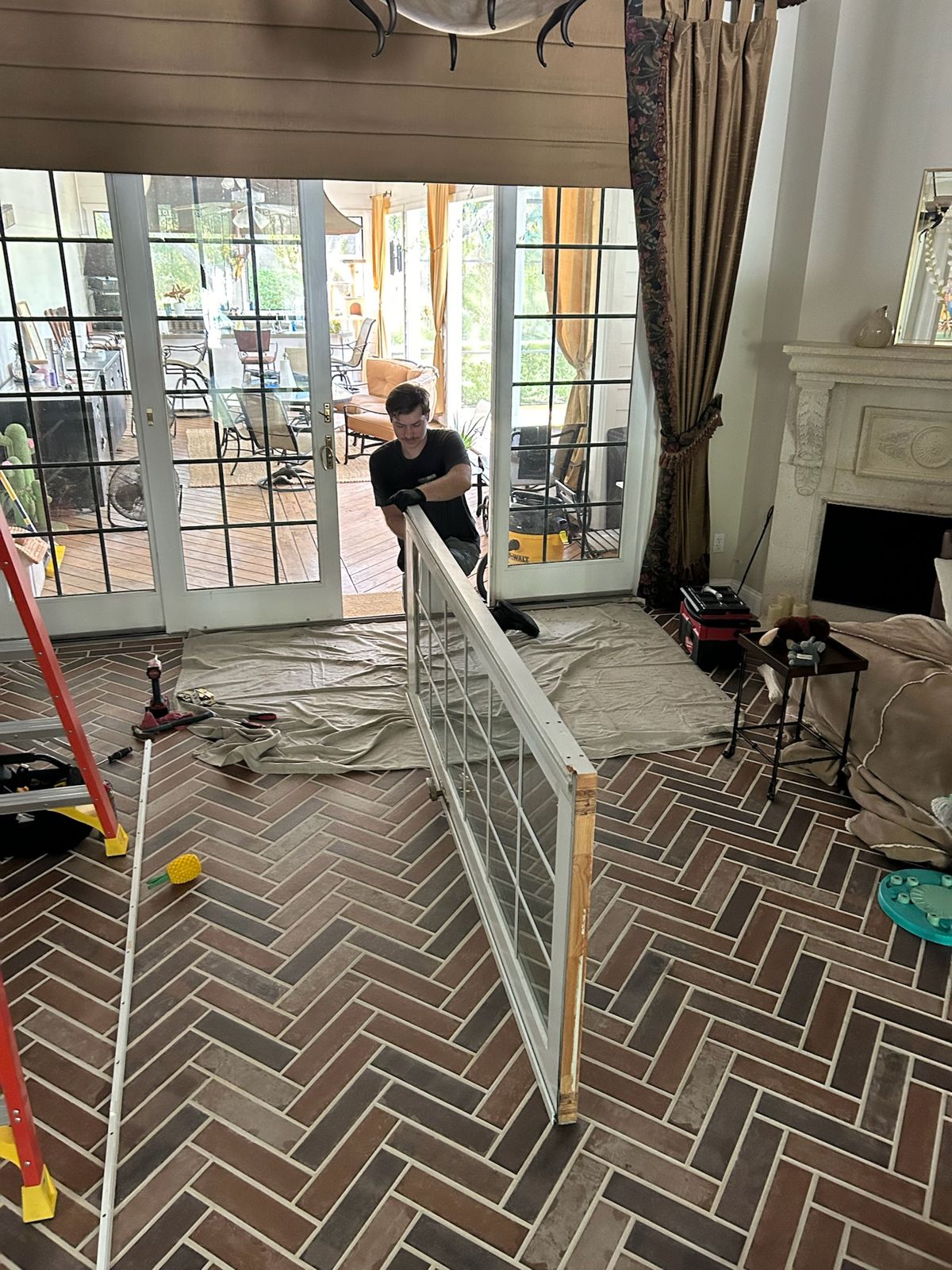 Sliding glass door frame staged indoors before installation — sliding glass door repair in Oviedo, Florida