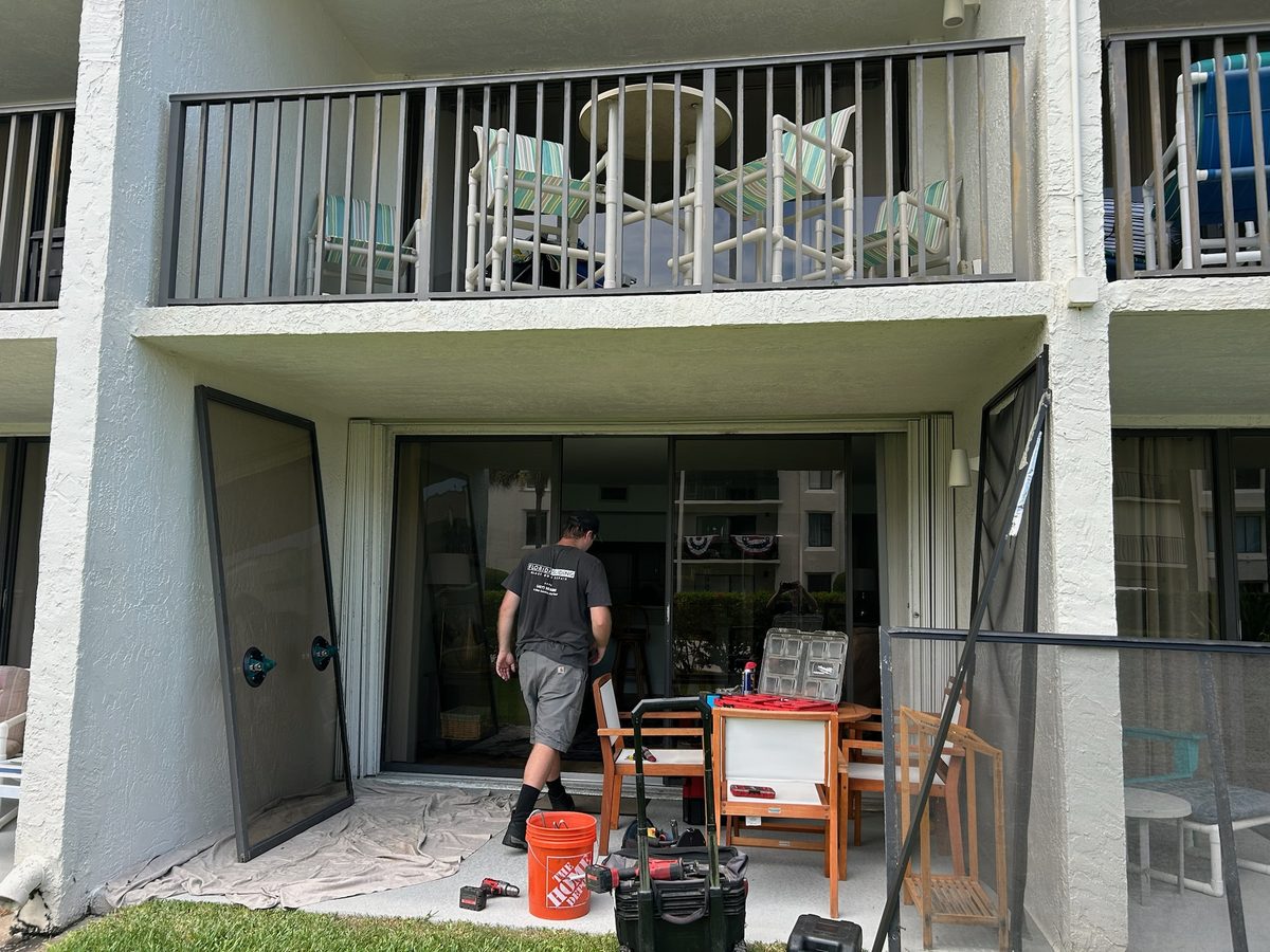 Florida multi-family building with balconies and sliding glass patio doors on every unit